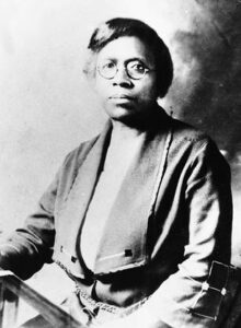 Dr Matilda Evans sitting in chair By U.S. National Library of Medicine